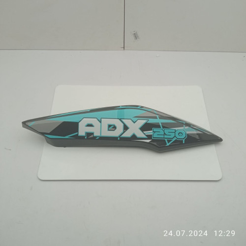 Пластик під сидінням задній лівий (чорн. синя наклейка) ADX250